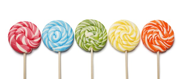 Tasty lollipops isolated on white, top view