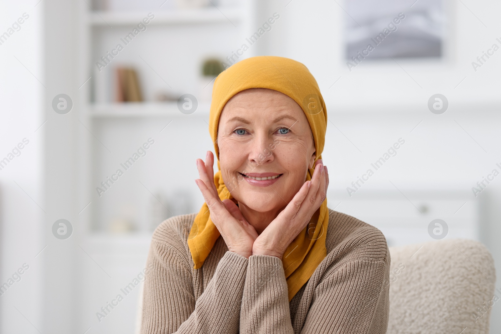 Photo of Portrait of senior woman with cancer at home