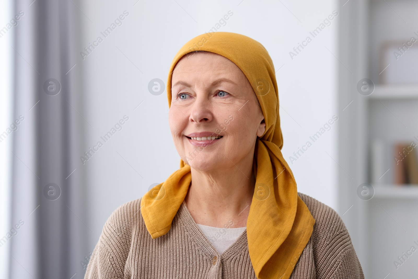 Photo of Portrait of senior woman with cancer at home