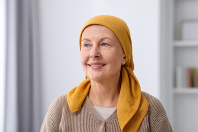 Photo of Portrait of senior woman with cancer at home