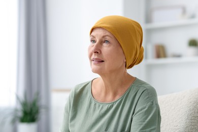 Photo of Portrait of senior woman with cancer at home