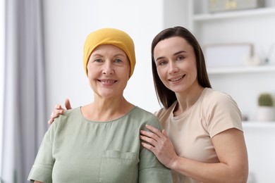 Photo of Woman with cancer and her daughter at home