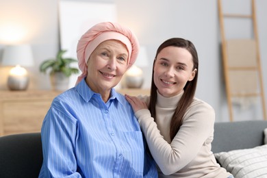 Photo of Woman with cancer and her daughter at home