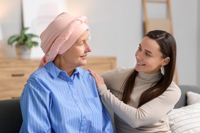 Photo of Woman with cancer and her daughter at home