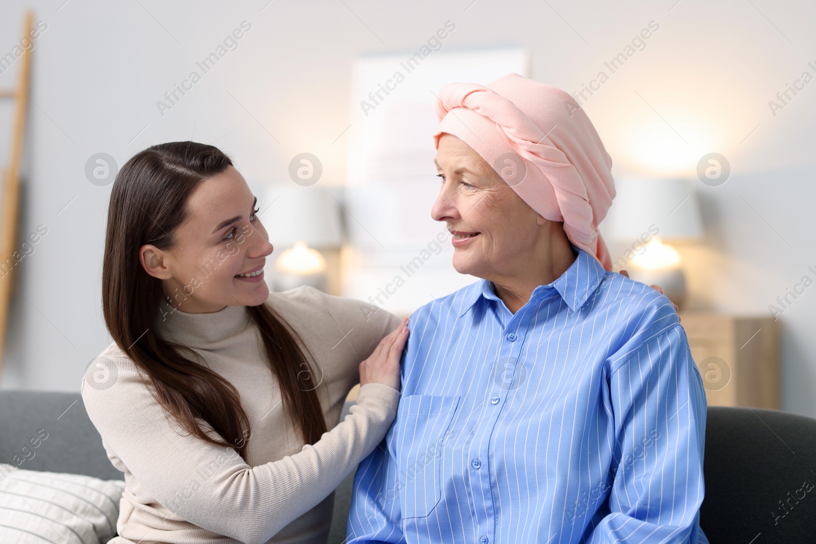 Photo of Woman with cancer and her daughter at home