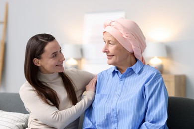 Photo of Woman with cancer and her daughter at home