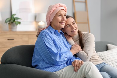 Photo of Woman with cancer and her daughter at home