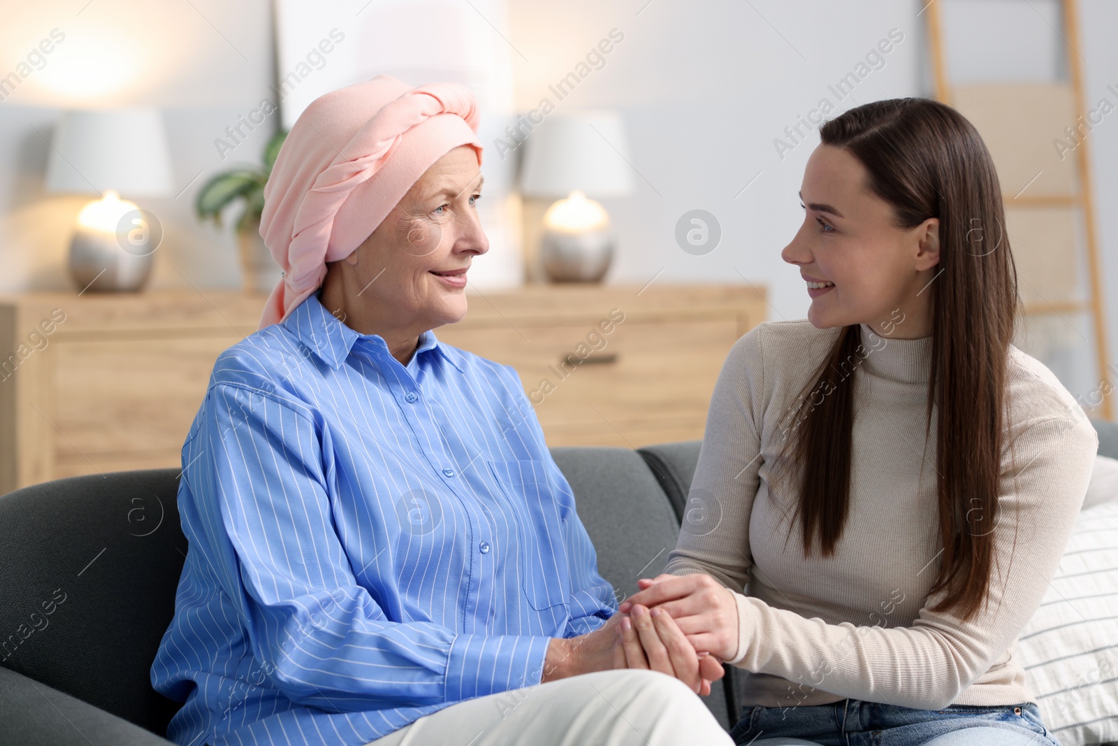 Photo of Woman with cancer and her daughter at home