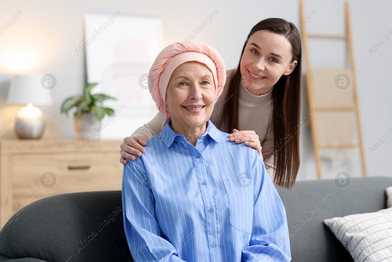 Photo of Woman with cancer and her daughter at home