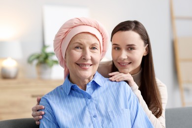 Woman with cancer and her daughter at home