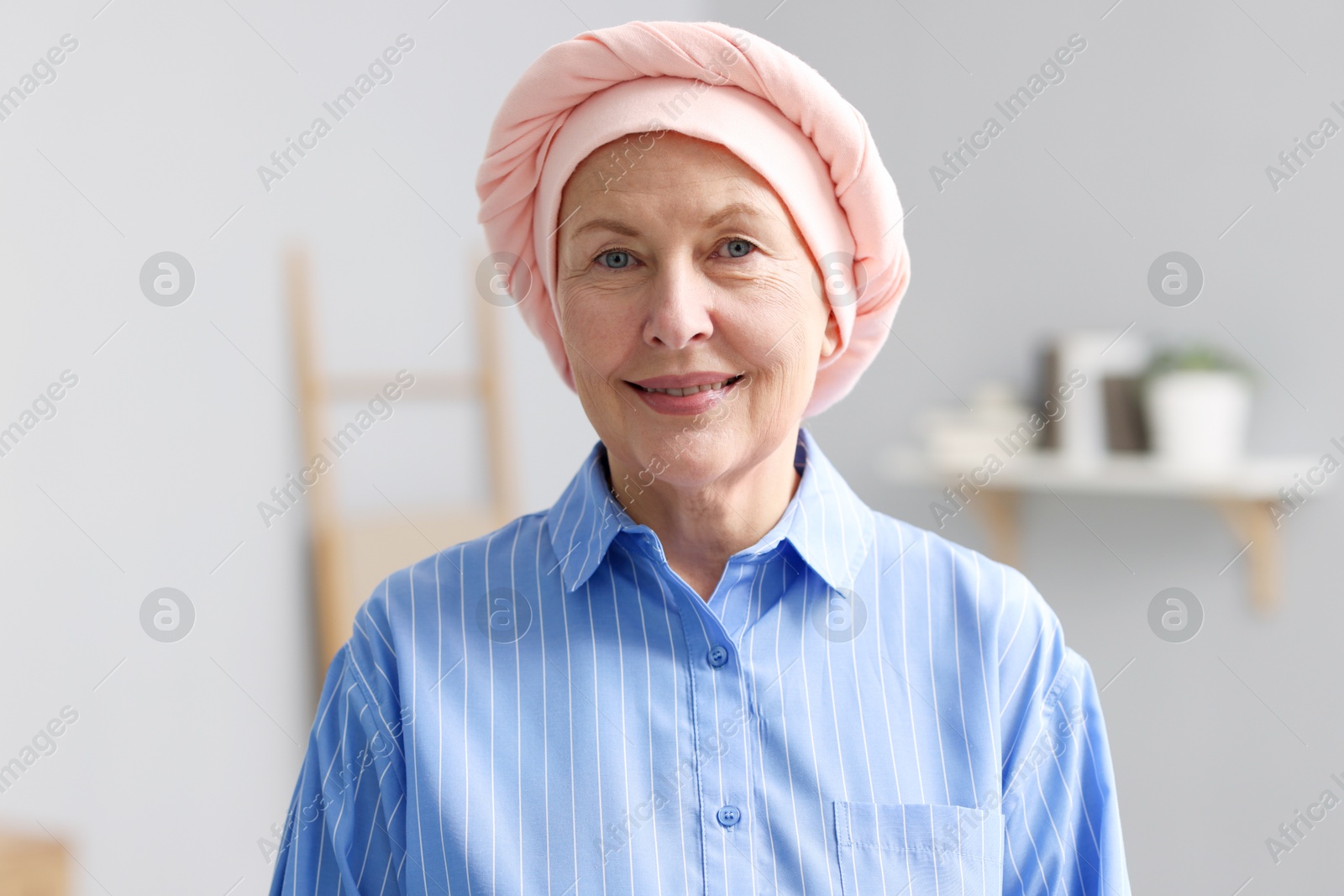 Photo of Portrait of senior woman with cancer at home