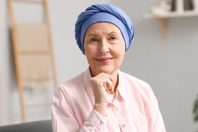 Photo of Portrait of senior woman with cancer at home