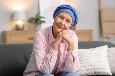 Photo of Senior woman with cancer on sofa at home