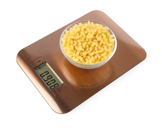 Photo of Electronic kitchen scale with bowl of raw pasta isolated on white