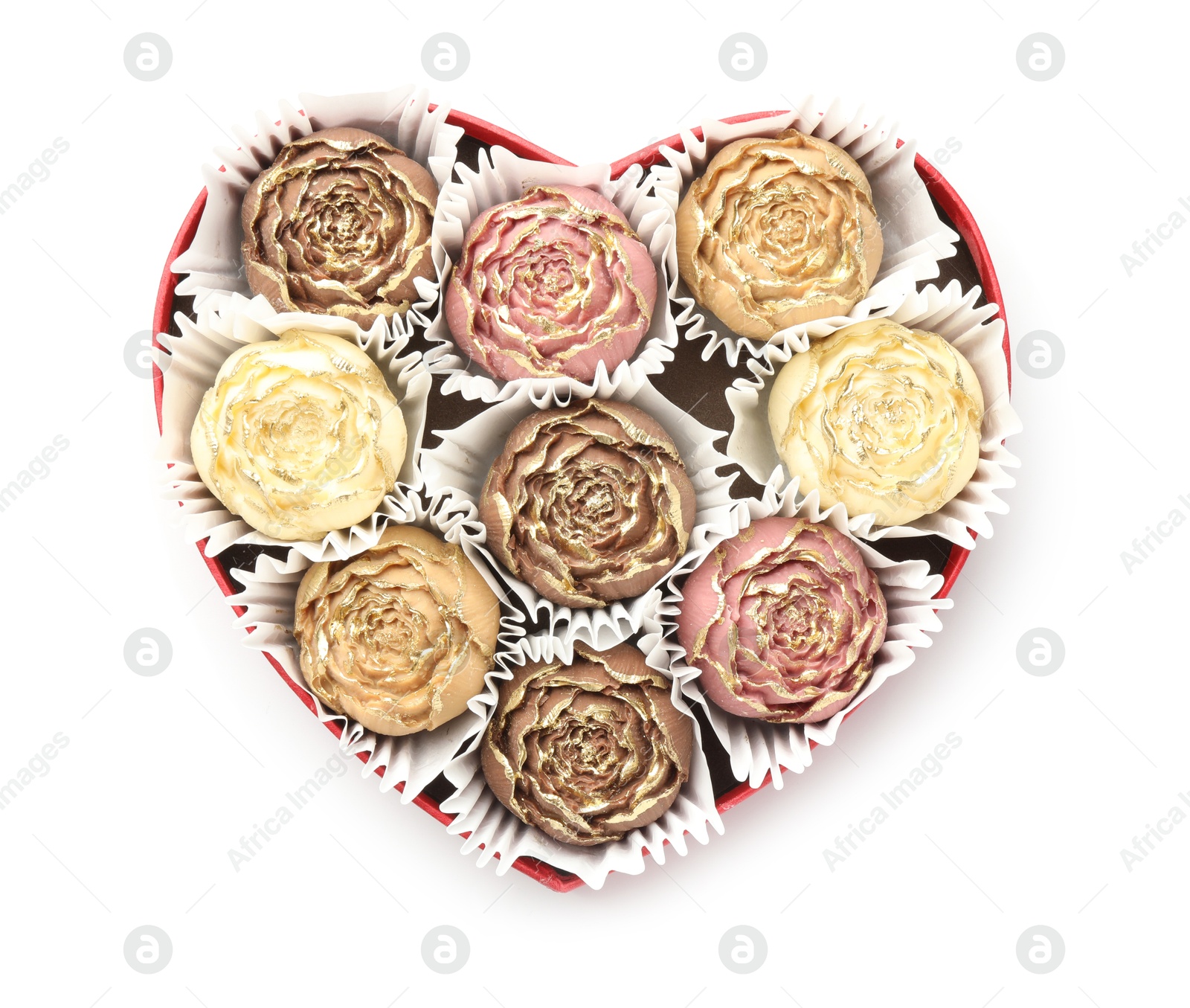 Photo of Flower shaped chocolate bonbons in box isolated on white, top view