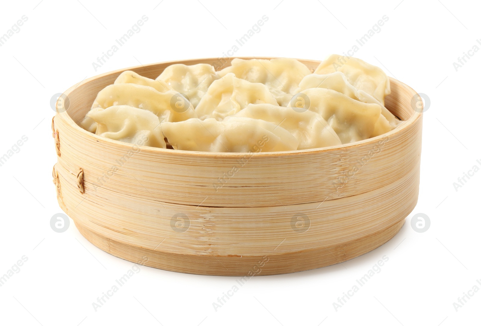 Photo of Tasty boiled gyoza (dumplings) in bamboo steamer on white background