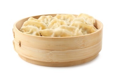 Photo of Tasty boiled gyoza (dumplings) in bamboo steamer on white background