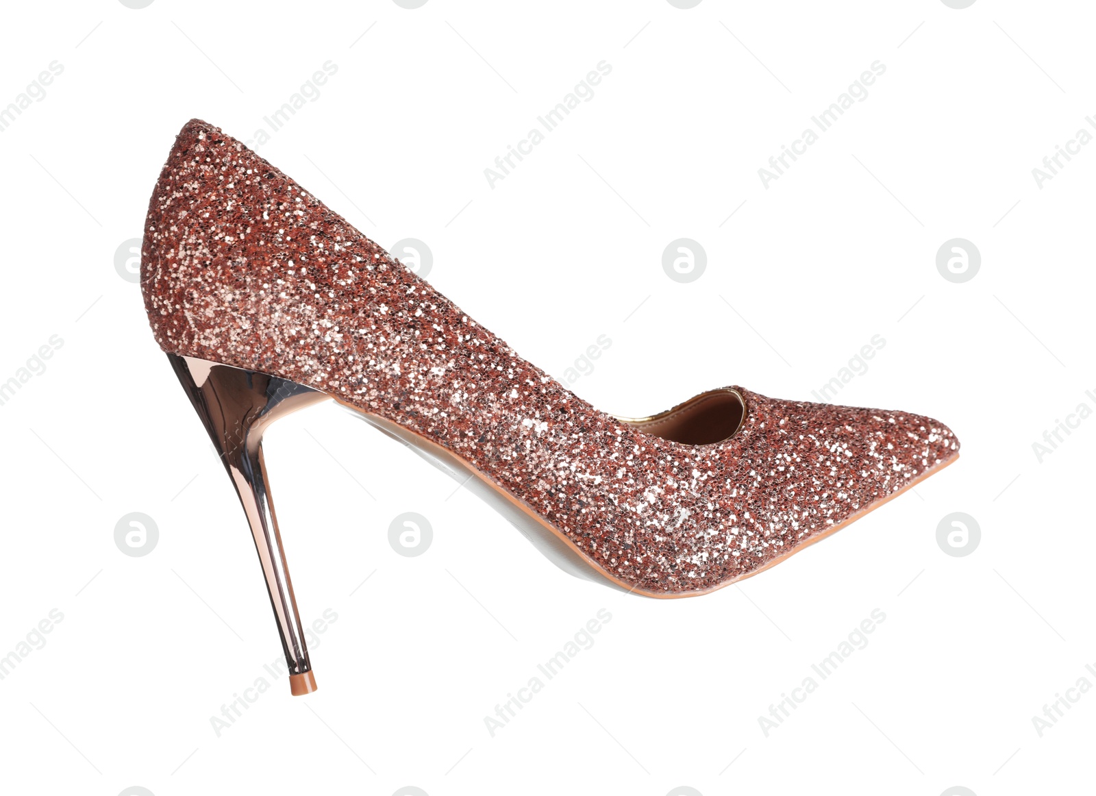 Photo of Shiny high heeled shoe in air isolated on white