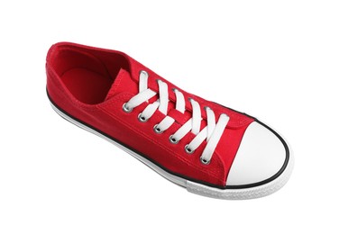 Photo of One red sneaker in air isolated on white