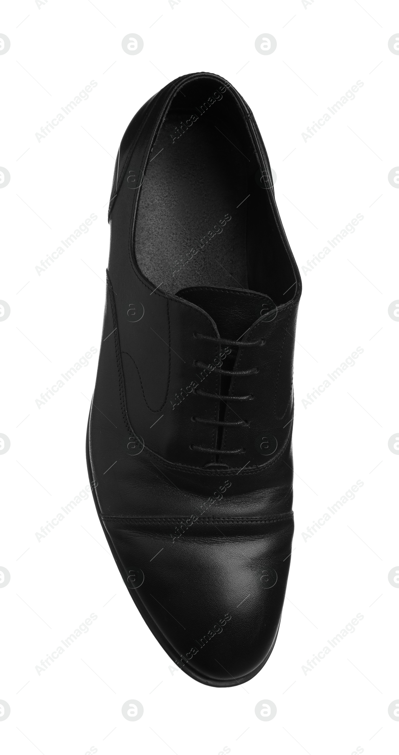 Photo of Black leather shoe in air isolated on white