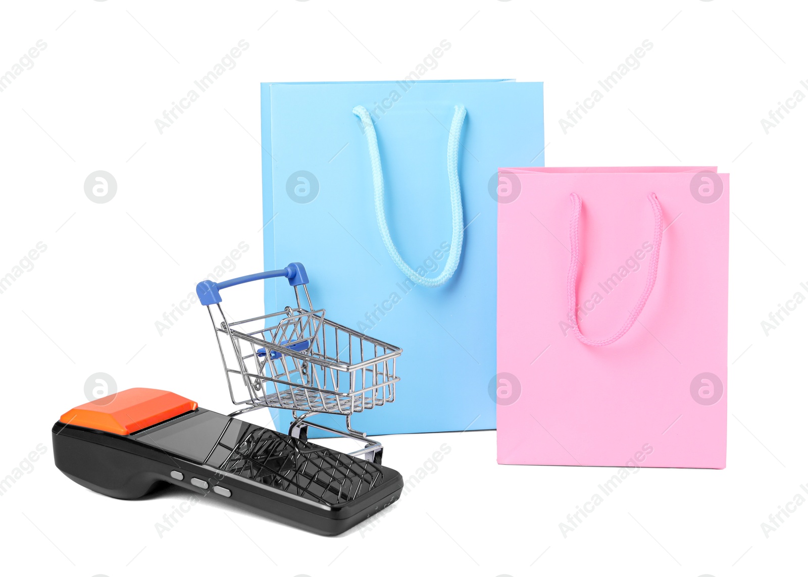 Payment terminal, shopping bags and mini cart isolated on white Photo of Payment terminal, shopping bags and mini cart isolated on white