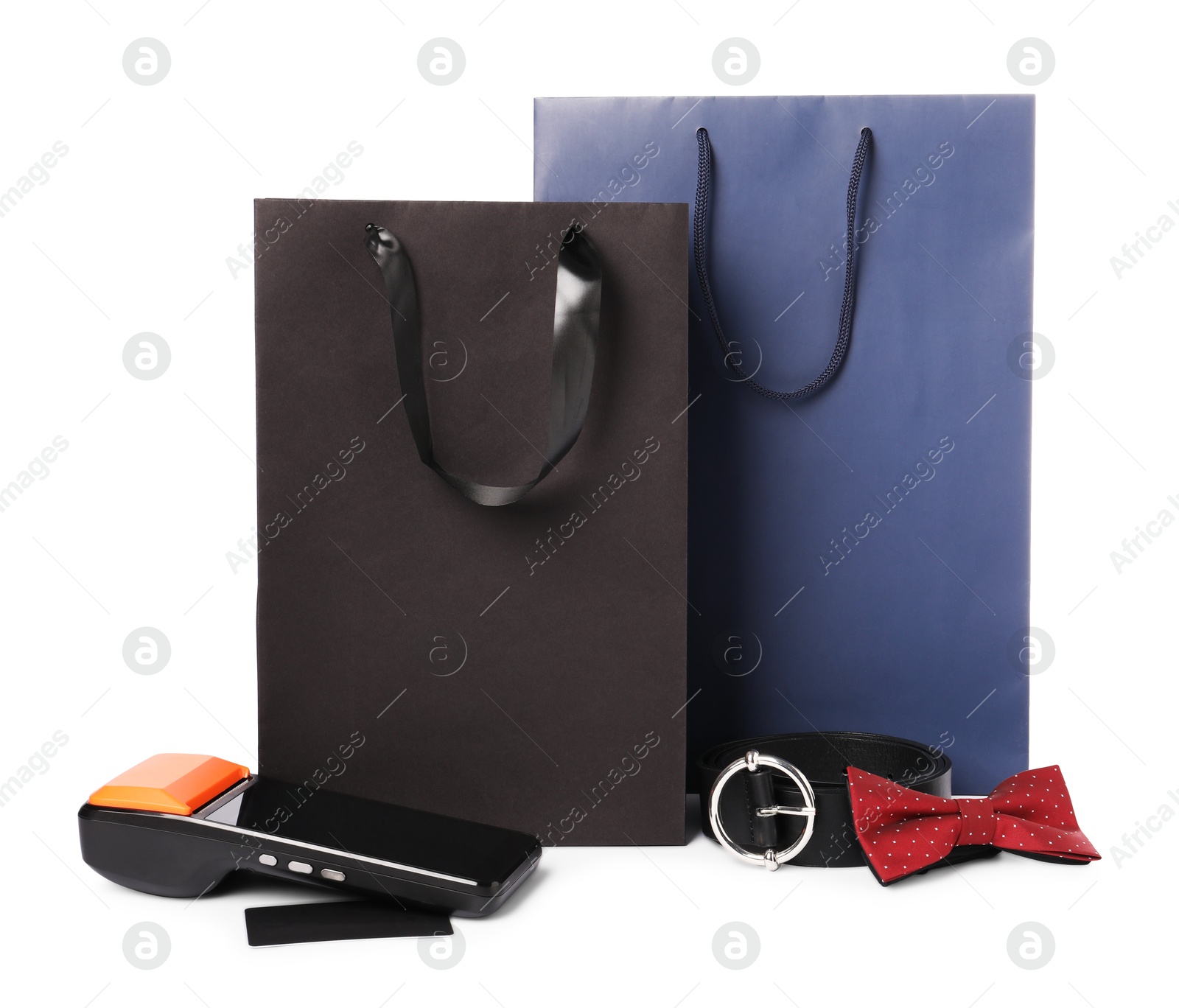 Photo of Payment terminal, shopping bags and accessories isolated on white