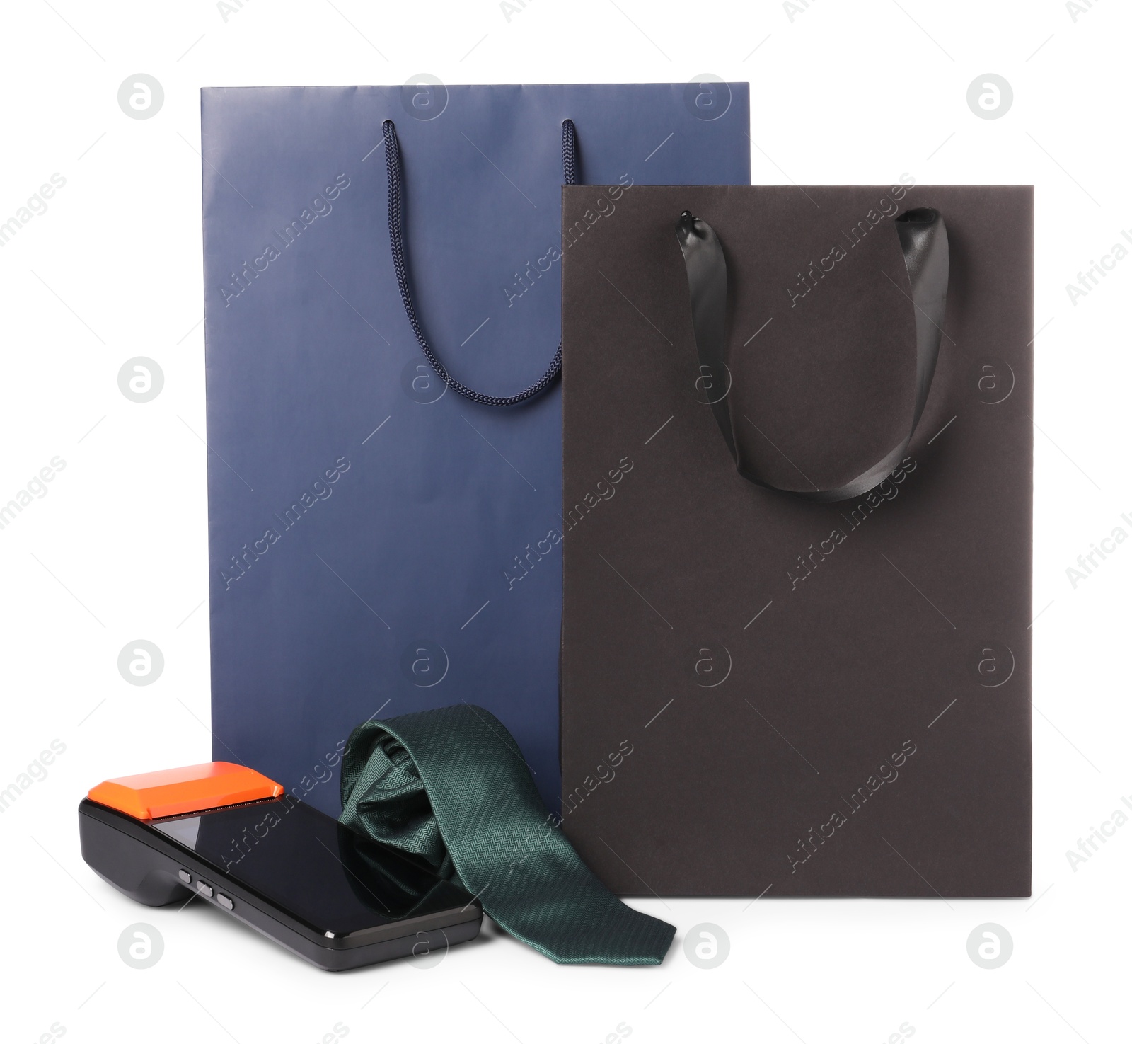 Payment terminal, shopping bags and tie isolated on white Photo of Payment terminal, shopping bags and tie isolated on white