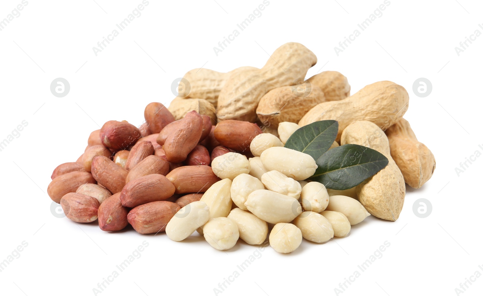 Pile of different peanuts and leaves isolated on white Photo of Pile of different peanuts and leaves isolated on white