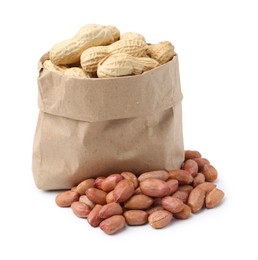 Photo of Fresh peanuts and paper bag isolated on white