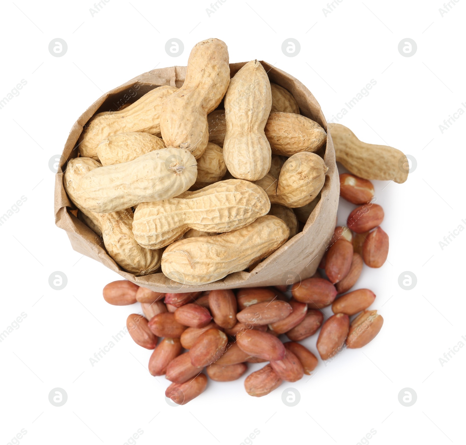 Fresh peanuts and paper bag isolated on white, top view Photo of Fresh peanuts and paper bag isolated on white, top view