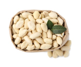 Photo of Peeled peanuts in paper bag isolated on white, top view