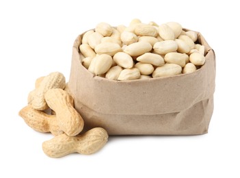 Photo of Peeled peanuts in paper bag and unpeeled ones isolated on white