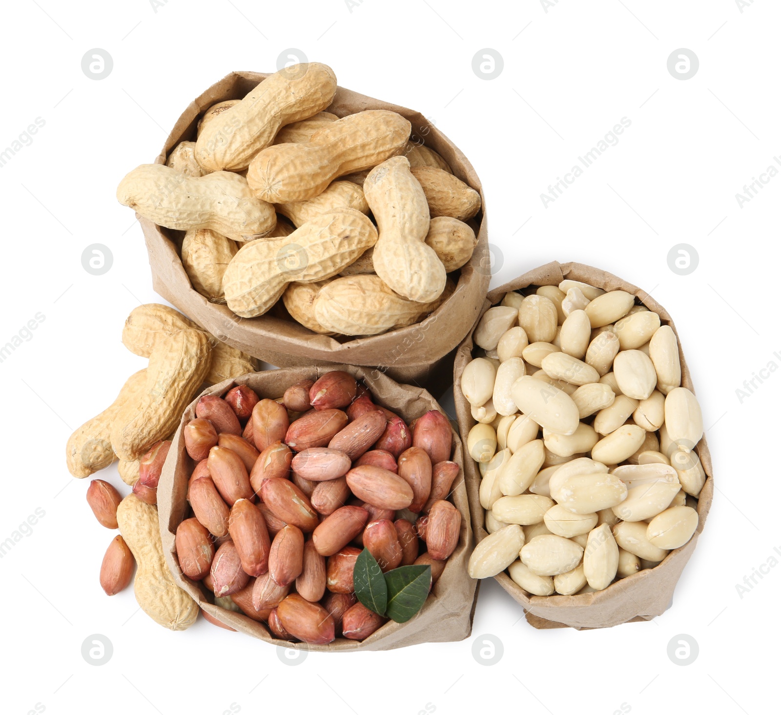Different peanuts in paper bags isolated on white, top view Photo of Different peanuts in paper bags isolated on white, top view