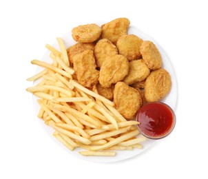 Photo of Tasty chicken nuggets and french fries with sauce isolated on white, top view