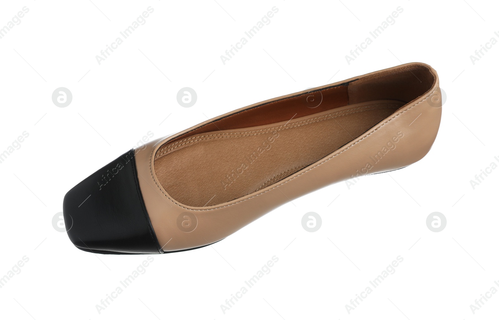 Photo of One ballet flat in air isolated on white