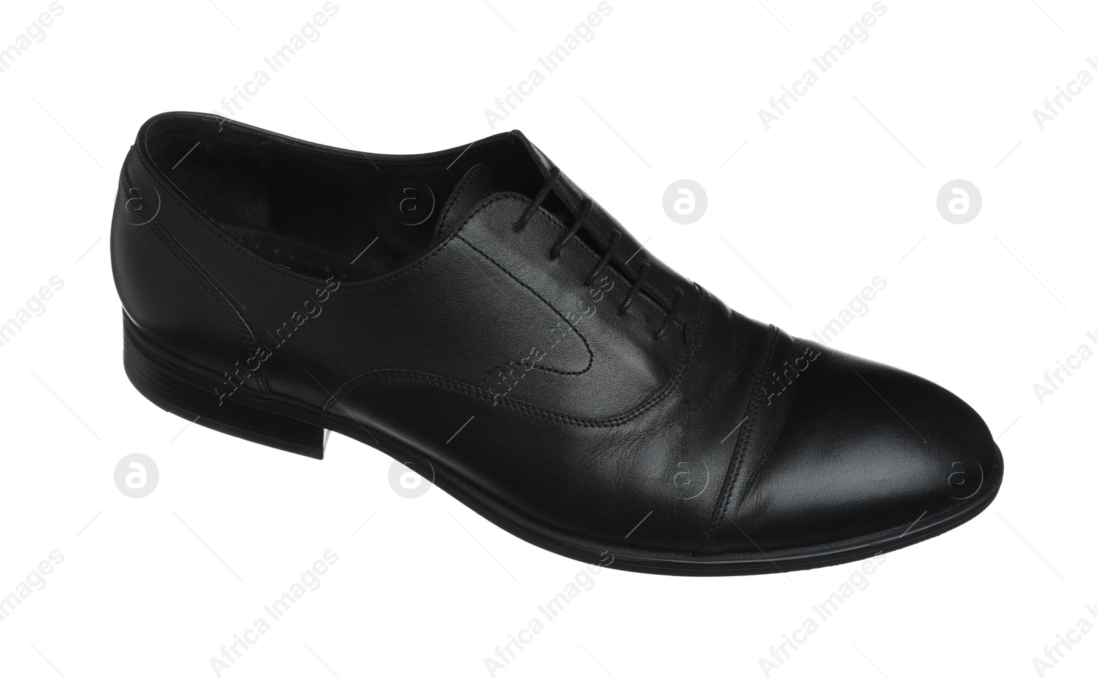 Photo of Black leather shoe in air isolated on white