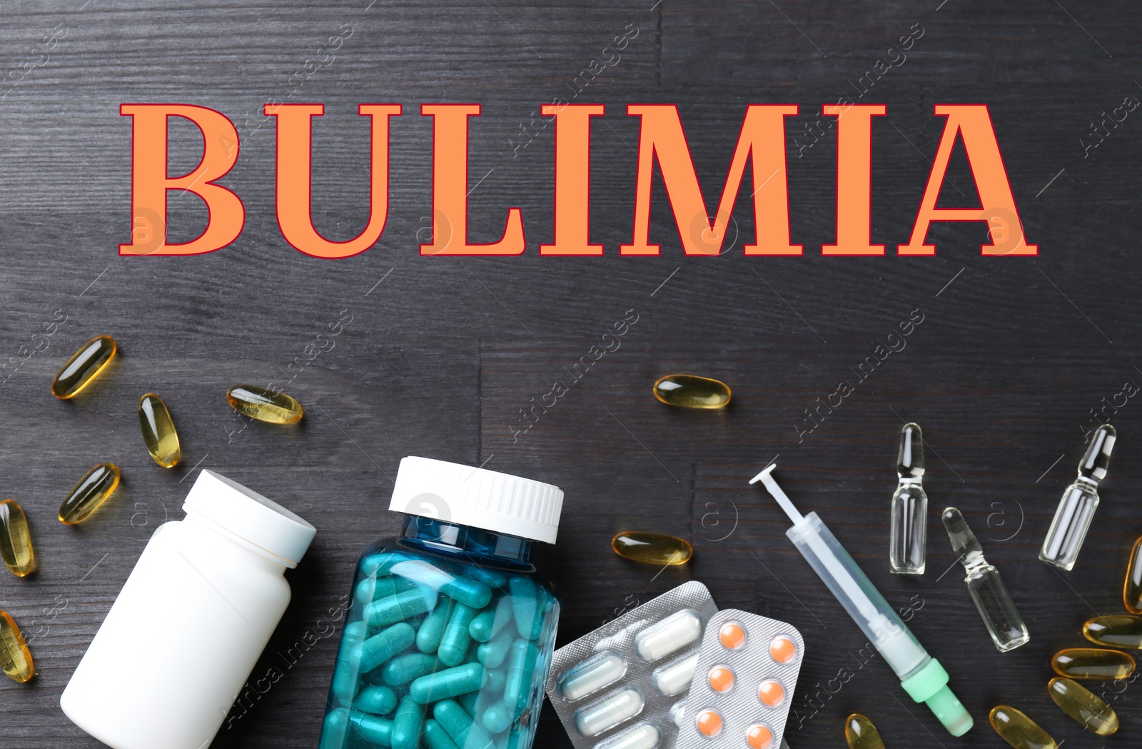 Image of Bulimia nervosa. Different drugs on dark grey background, flat lay