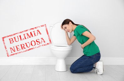 Image of Bulimia nervosa. Young woman suffering from nausea in bathroom