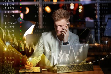 Businessman working in office at night, double exposure with data and graphs. Trading