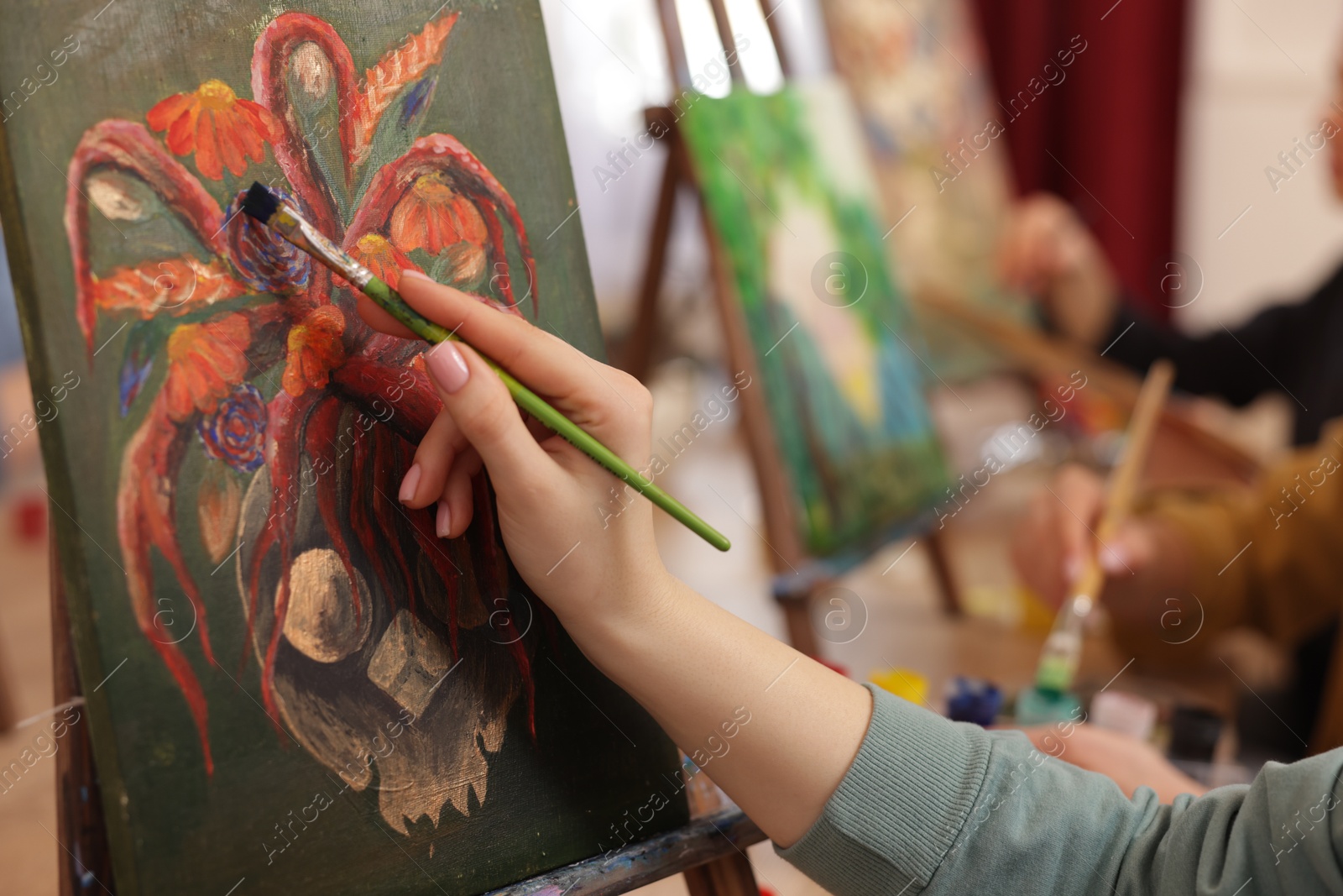 Photo of Women learning to draw in class, closeup