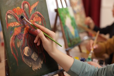 Photo of Women learning to draw in class, closeup