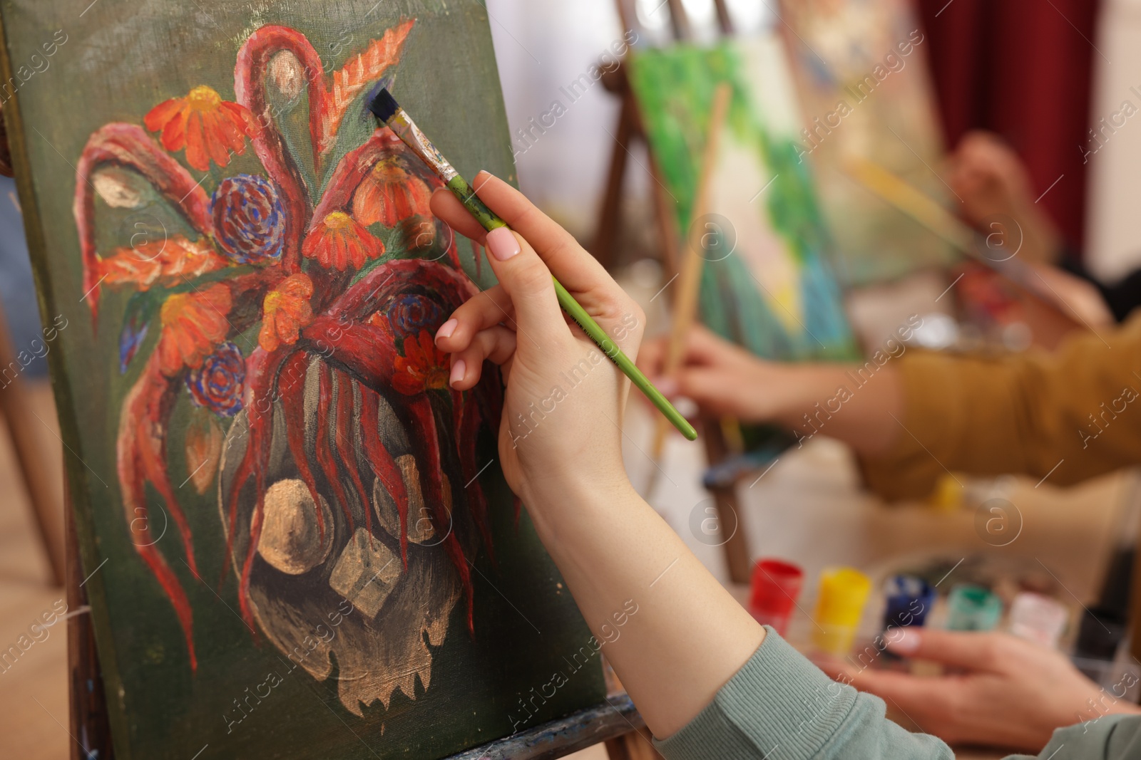 Photo of Women learning to draw in class, closeup