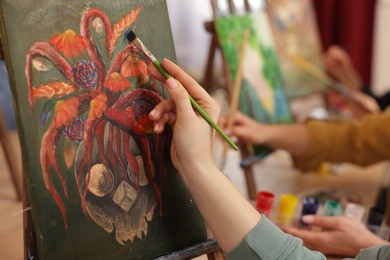 Photo of Women learning to draw in class, closeup