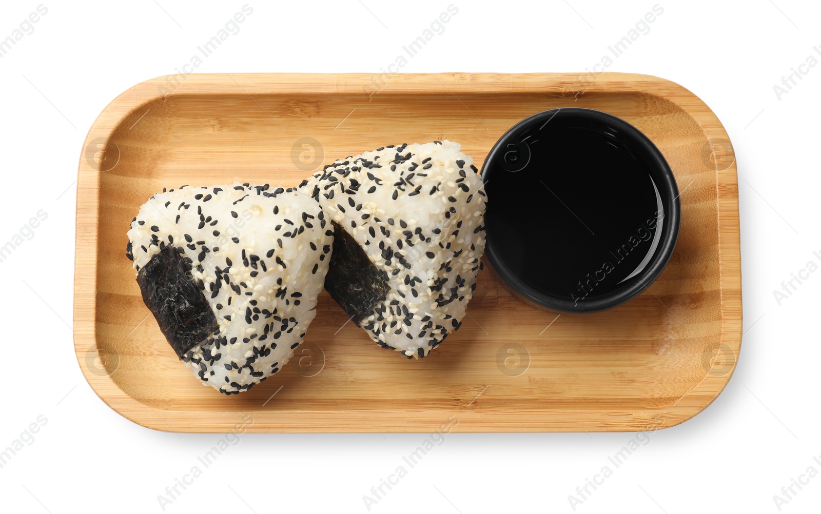 Photo of Rice balls (onigiri) and soy sauce isolated on white, top view. Traditional Japanese dish