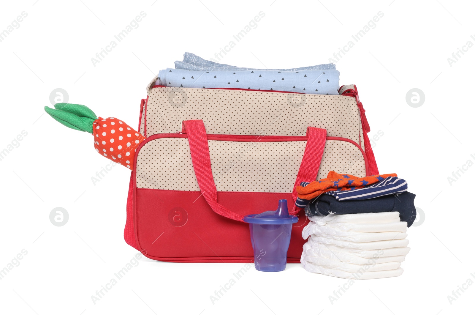 Photo of Mother's bag with baby's stuff isolated on white