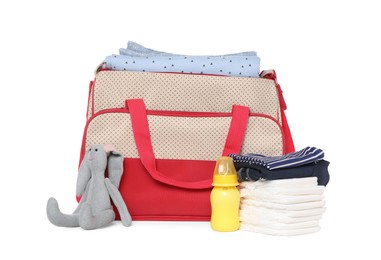 Photo of Mother's bag with baby's stuff isolated on white