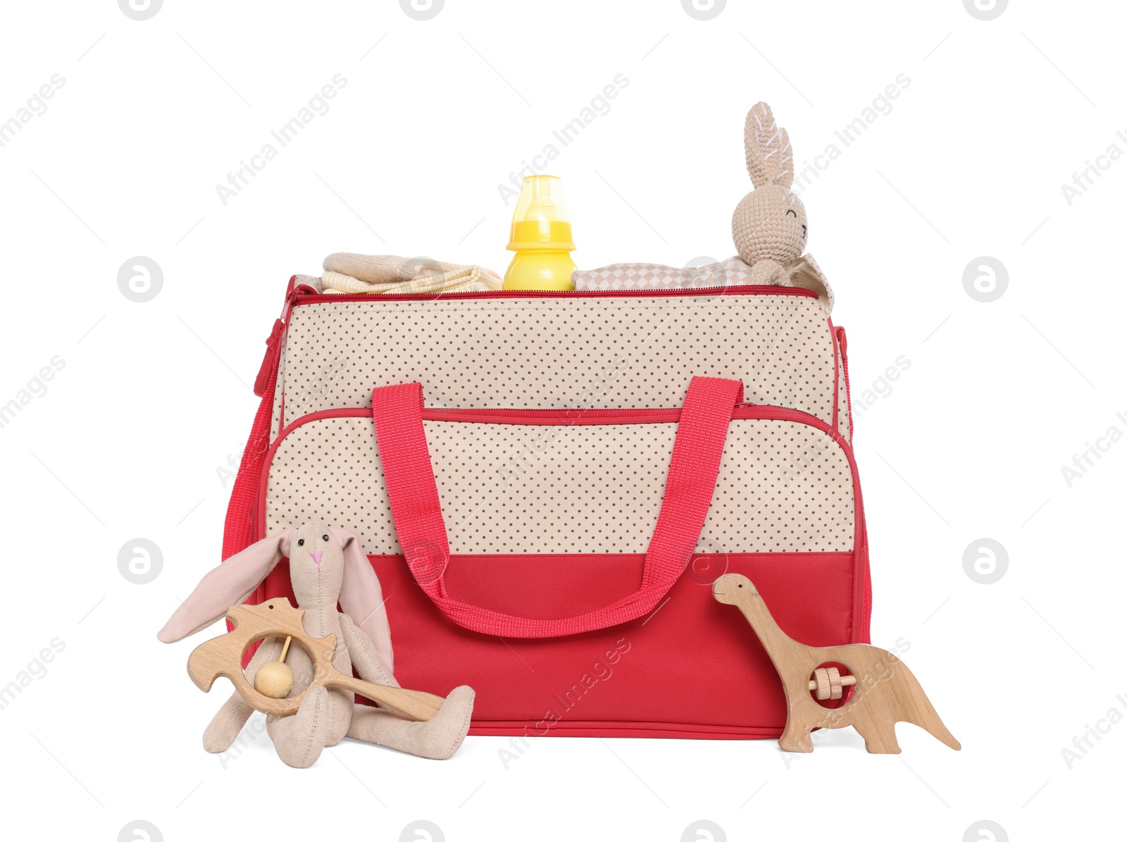 Photo of Mother's bag with baby's stuff isolated on white