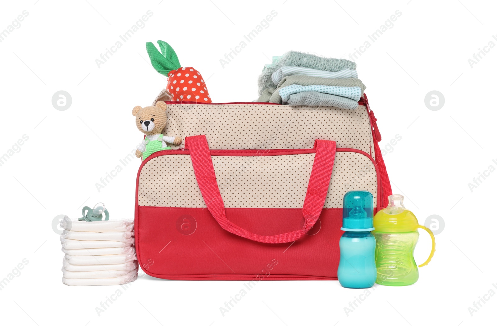 Photo of Mother's bag with baby's stuff isolated on white