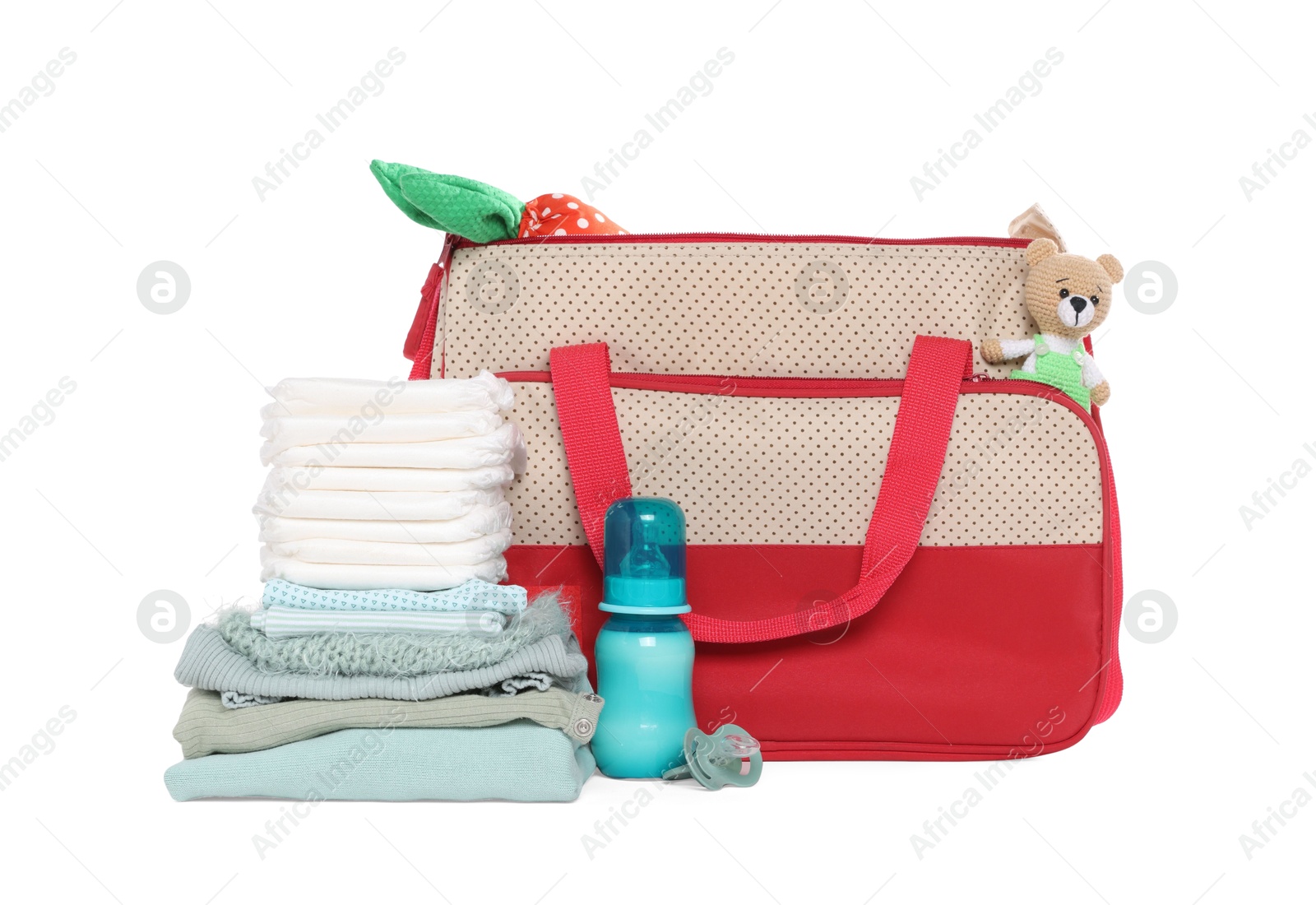 Photo of Mother's bag with baby's stuff isolated on white