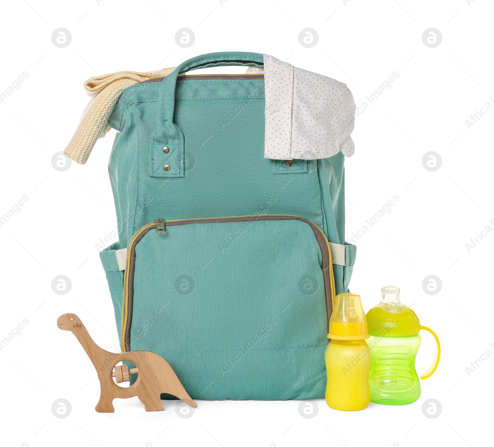 Photo of Mother's bag with baby's stuff isolated on white